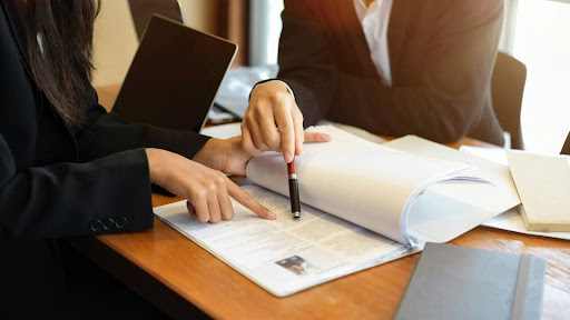 Tampa personal injury attorney reviewing settlement value with client